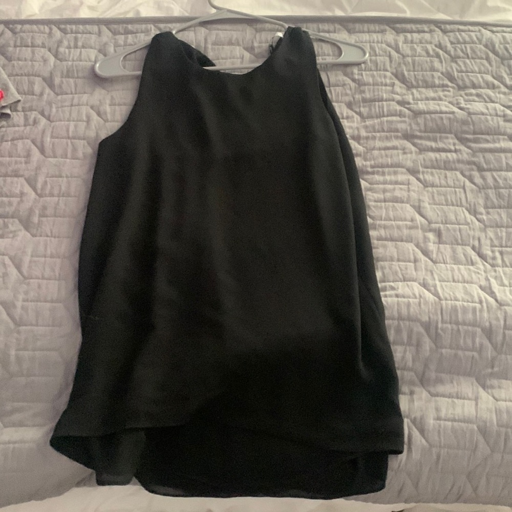 Super pretty and flowy top in great condition!